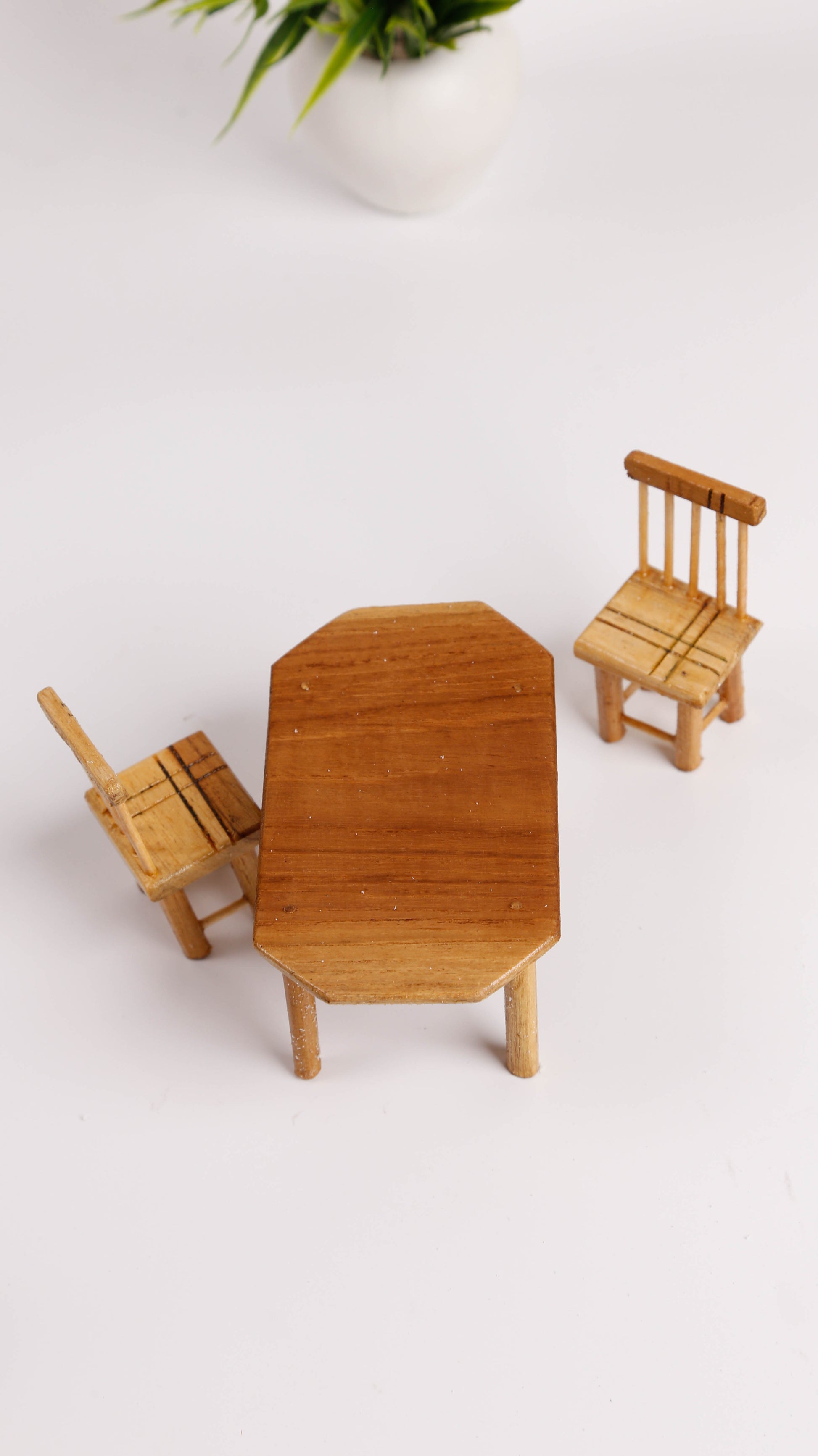 miniature wooden chairs