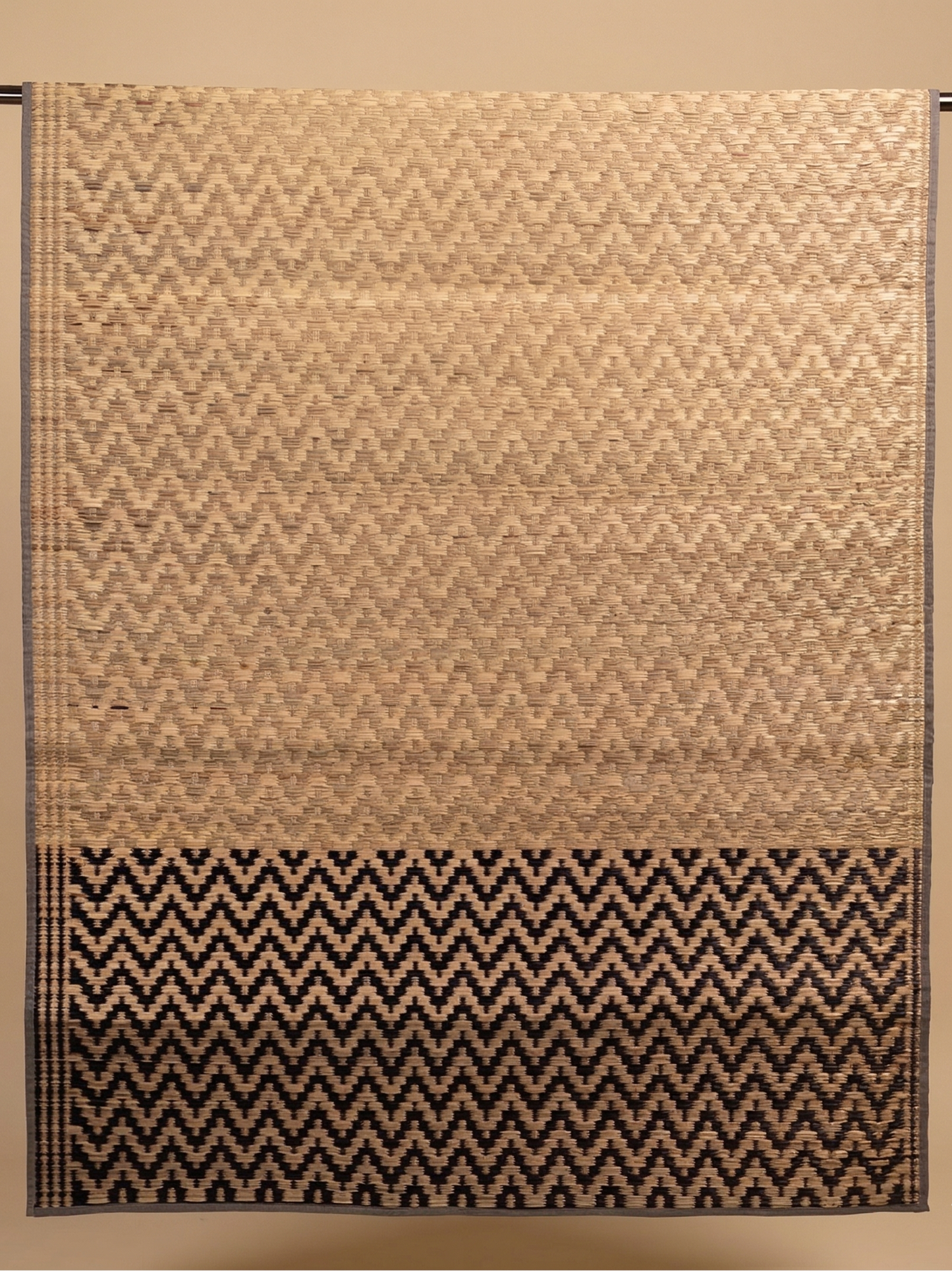 Aruvi Pattamadai Pai with a zigzag pattern on a beige background
