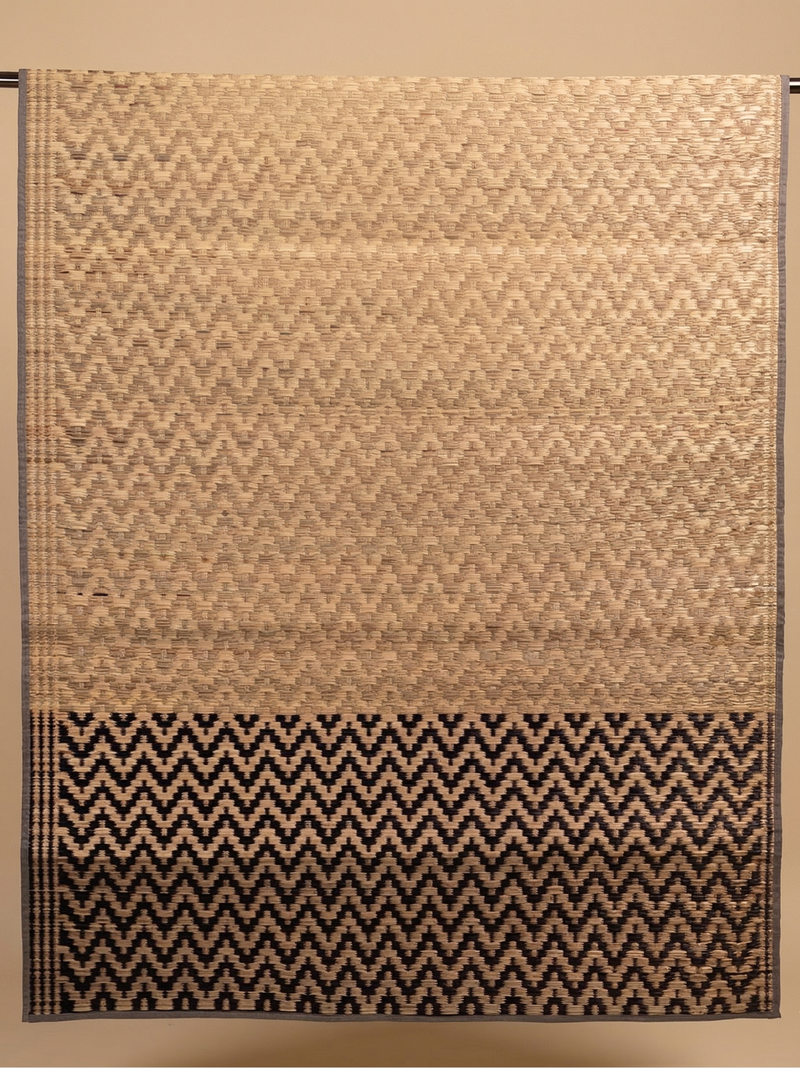 Aruvi Pattamadai Pai with a zigzag pattern on a beige background