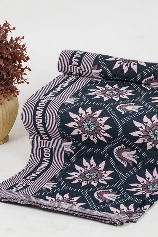 Patterned fabric with 'Gowndara' branding on a white surface