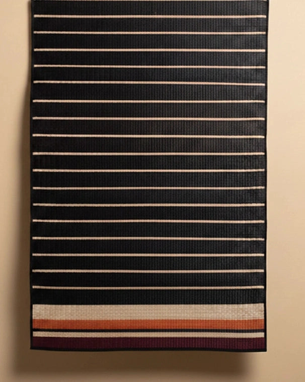 Striped fabric with horizontal lines on a beige background