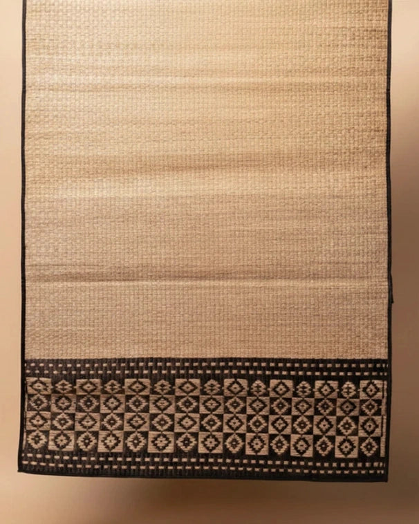 Textile with a geometric pattern on a beige background