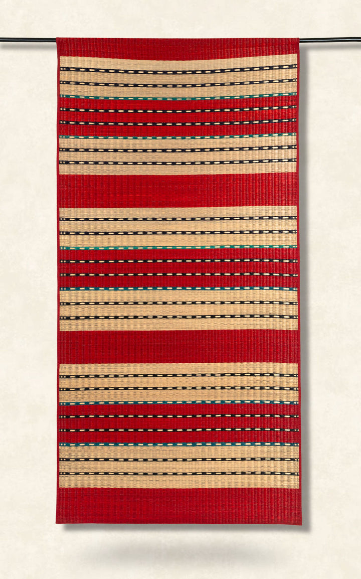 Red and beige striped fabric on a white background
