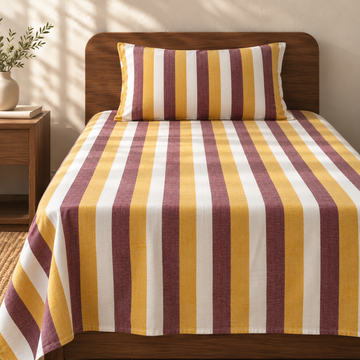 Chennimalai Single Cot Bedspread Mustard and Maroon with matching pillow covers, square bedroom photograph