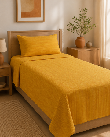 Chennimalai Single Cot Bedspread Mustard Yellow Textured — Warm-room styling view