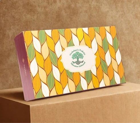 Packaged product with a colorful leaf pattern on a brown surface