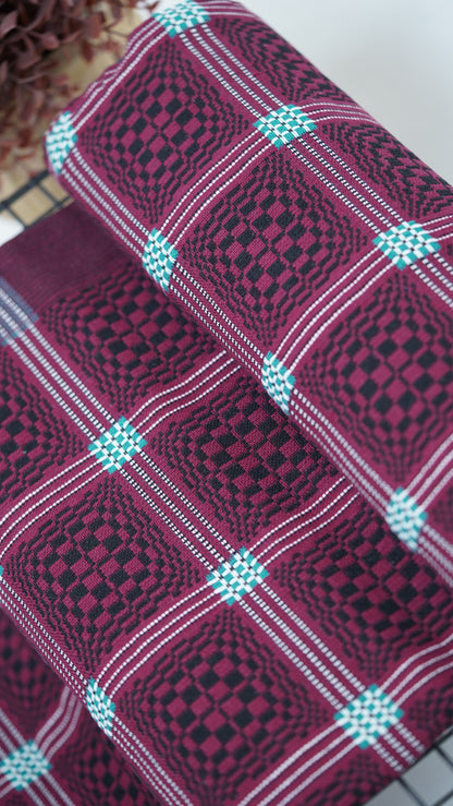 Maroon Nadhiya Chennimalai Bedsheet on a light background