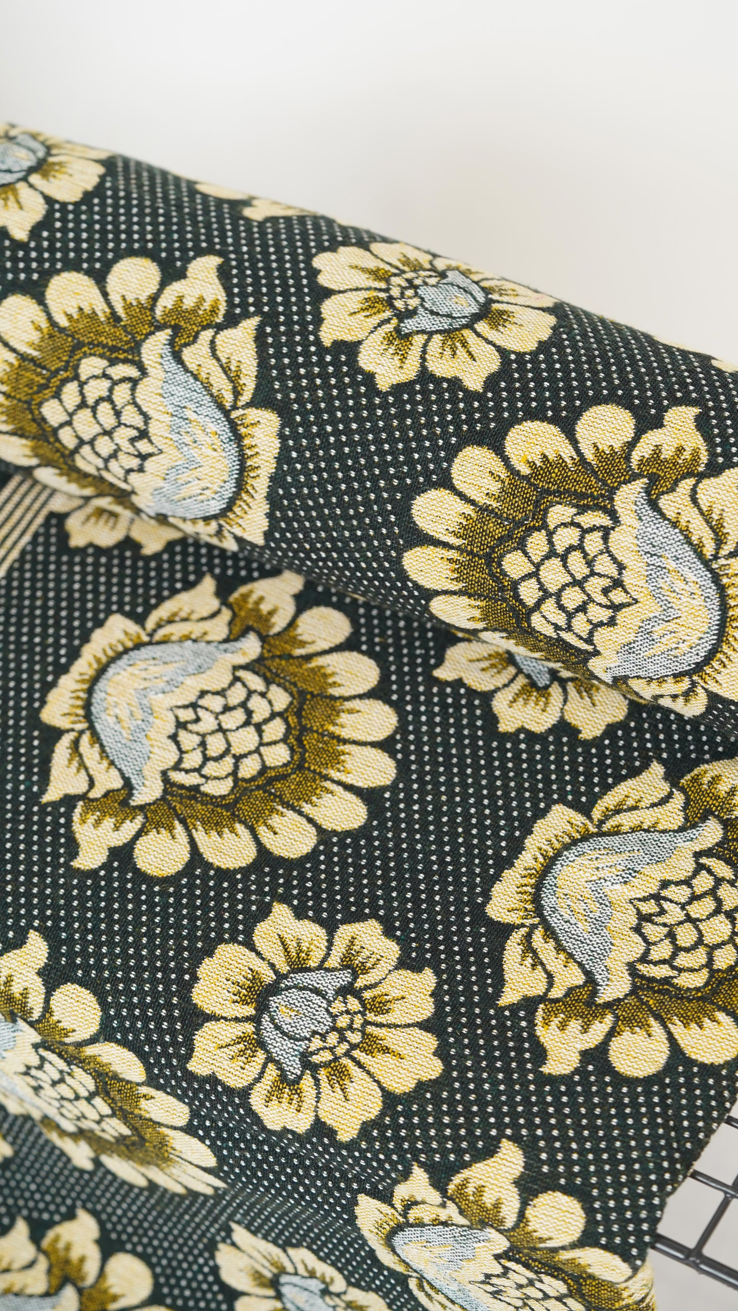 Floral patterned fabric with yellow and beige flowers